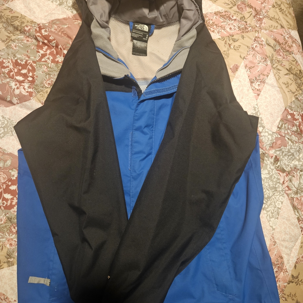 The North Face Kids Black and Blue Raincoat
